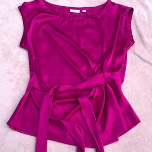 Hot pink sleeveless blouse